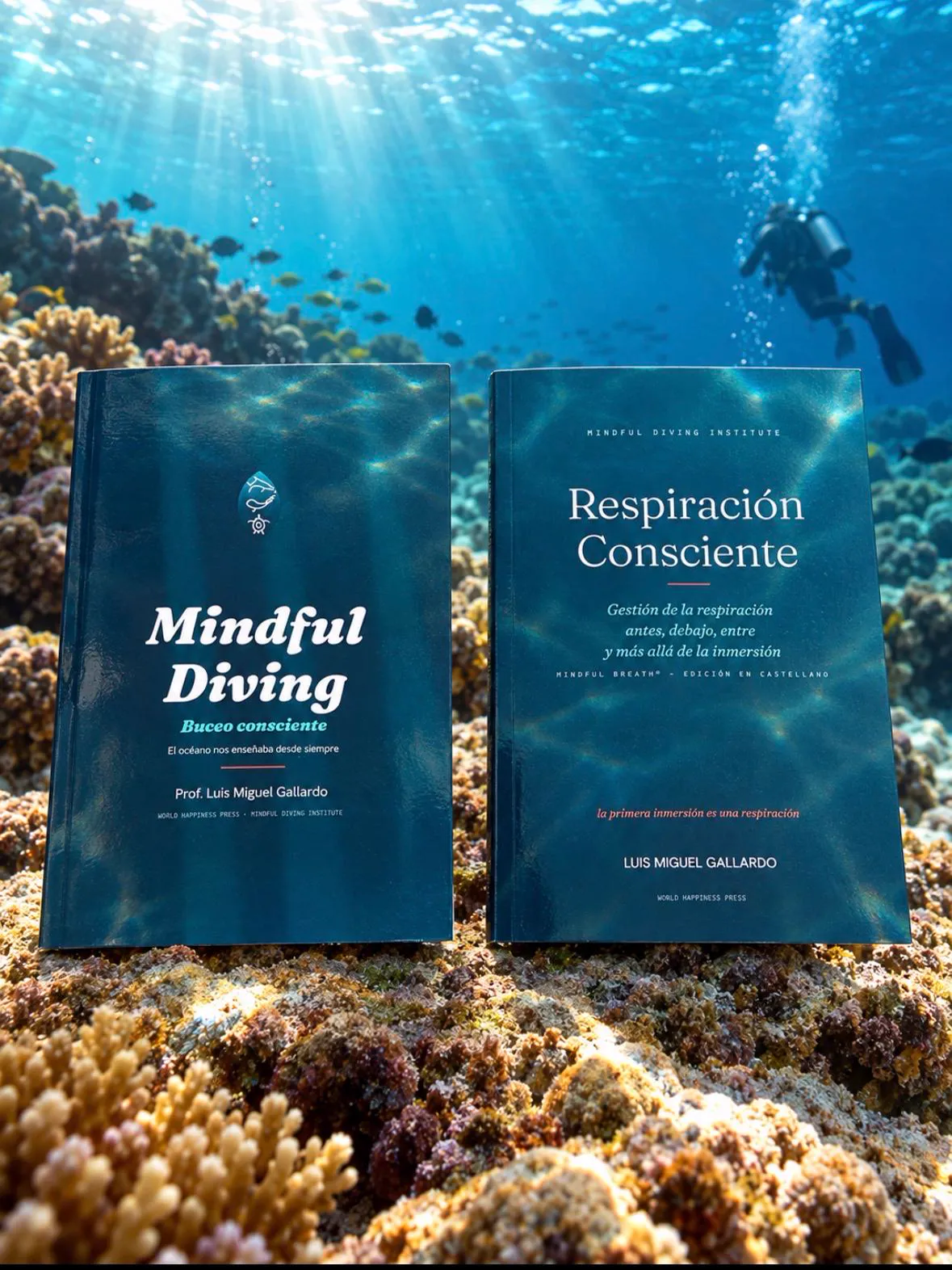 The Mindful Diving and Respiración Consciente books resting on a reef